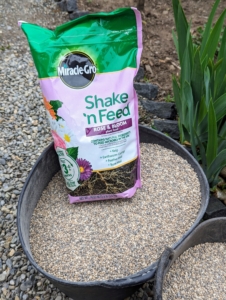 For these plants, we’re using Miracle-Gro Shake 'n Feed Rose & Bloom fertilizer which contains micronutrients and natural ingredients, to nourish above and below the soil. Itoh peonies are sensitive to high levels of nitrogen, so when fertilizing in spring and summer, be sure to use a fertilizer that contains a low level of nitrogen.