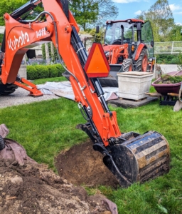And then our trusted Kubota M62 tractor and backhoe are used to remove the soil.