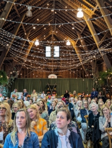 The event was held at the historic back-country barn at Highland Farm. This structure contains much of the original exterior and interior including the hay bale tracks in the ceiling and beams. Every seat was filled.