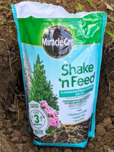 For these we're using Scott's Miracle-Gro Shake 'n Feed, which is an all-purpose plant food containing bone meal, earthworm castings, feather meal, and kelp to support root development and strength.