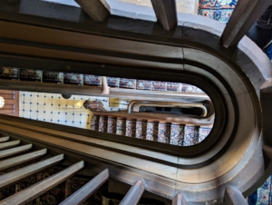 This beautiful spiral wood back staircase takes visitors up to the fifth floor tower where one can see panoramic views of the Hudson River and New York City as well as all the way down to the basement kitchen.