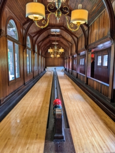 And not far from the main house is the Bowling Alley, one of the earliest bowling lanes in the United States. Anna Gould used the bowling alley for visiting soldiers during World War II. Although the structure fell into disrepair in the 1950s, it was restored and opened for public tours. The building was also used as a school where local women could learn sewing and other skills.