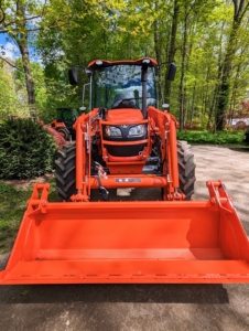 The bucket attachment is used for so many things – from transporting mulch and compost to carrying heavy potted plants to delivering heavy stone and logs.