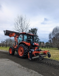 When the rake is lowered onto the road surface and tilted to the proper angle, this attachment moves the gravel and road dust to the center, creating a crown. On less used roads, the power rake freshens up the existing gravel as it turns and brings any compacted gravel to the surface.