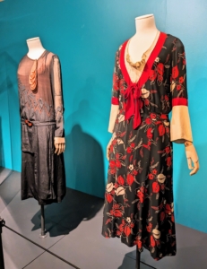 After 1926, the hemlines on dresses lengthens like on these day dresses. Notice the subtle detailing and interesting necklines.