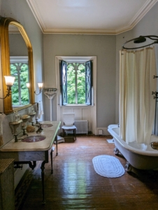 The family bathrooms were large in its day with marble sink counters and claw foot tubs.