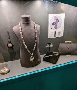 Chanel also created costume jewelry lines for both day and evening wear. Some of these pieces were featured Harper's Bazaar in 1928. Women in the late 20s were heavily jeweled and were free to carry accessories. See this "Influencers: 1920s Fashion and the New Woman" exhibition at the Lyndhurst if you can - it's interesting, informative and fun.