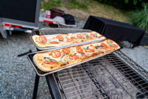 The Jerusalem foccacia is made with a very soft and fluffy dough topped with olive oil tomatoes, onions, and other vegetables. (Photo by Charles Wills)