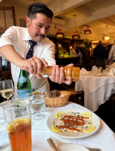 Waiter Manuel sprinkled just a bit of pepper on the Vitello Tonnato. This is another classic Italian dish of cold, thinly sliced veal covered in a creamy sauce. The dish originated in Piedmont, Italy, and is often served chilled or at room temperature during the summer.