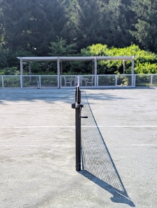 The surface of this court is gray clay, a wonderful surface to play on.