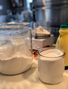 I decided to use a buttermilk biscuit topping, so I prepared my ingredients - flour, sugar, baking powder, baking soda, butter, and buttermilk.