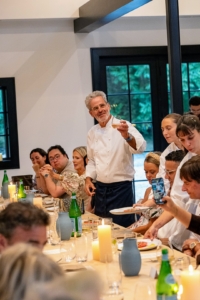 After everyone sat down for the meal, Chef Eyal made a welcoming toast. Chef Eyal is an Israeli celebrity chef noted for creating the Miznon restaurant chain. His New York City establishment Shmoné earned a Michelin Star last year. (Photo by Charles Wills)