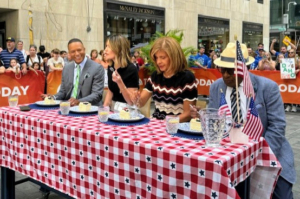 Hosts Craig Melvin, Savannah Guthrie, Hoda Kotb, and Al Roker sat at the nearby tasting table. All the hosts loved the cake.