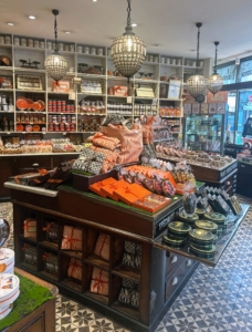 It is one of oldest sweets shops in Paris. Inside - beautiful displays of fine chocolates, candies, and other desserts.