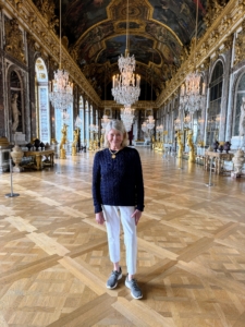 Here I am in the Hall of Mirrors, or Galerie des Glaces. It is the most celebrated room in the Château de Versailles. The room’s construction began in 1678. Germany pronounced itself an empire in the Hall of Mirrors in 1871, but later, in the same room, the 1919 treaty that ended the first world war was signed.