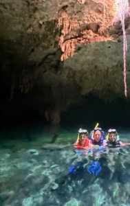 Matt, Alex, and Charlie snorkeled at Cenotes Dos Ojos. Sunlight seeping in from the crater above shows the impressive rock formations.