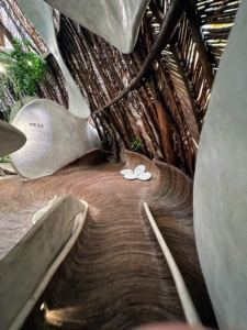 The AZULIK complex includes a museum, residences, and a restaurant all nestled within the Mayan jungle. Its purpose is to reconnect people with their origins, stimulate creativity, and promote art.