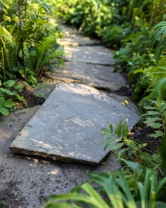 Some of the work being done is on the bluestone pavers in this footpath. These pavers shifted over time because of inclement weather and growing tree roots underneath.