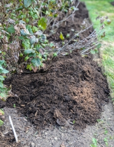 He does this for each area before raking into level, two to three inch layers.