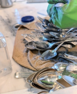 Elvira places a terry cloth towel on the bottom of the sink, so the metal doesn’t bang against any surfaces. I do this whenever washing delicate china pieces too – just in case something slips through the hands.