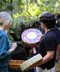 Here I am admiring one of the drums used in the dance presentation. (Photo by Samantha Jones for Heronswood)