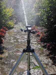 I also remind the team to keep the tripod sprinklers at the lowest height, so there is maximum coverage on the garden plants below the branches.