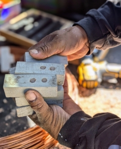 The wooden blocks are about three-and-a-half inches long - just enough to support the wire efficiently.