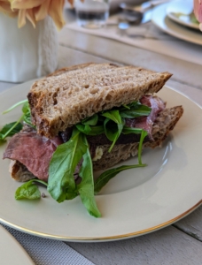 For the two gentlemen at my table, who needed more than just one sandwich, I made steak sandwiches, also dressed with fresh garden arugula.