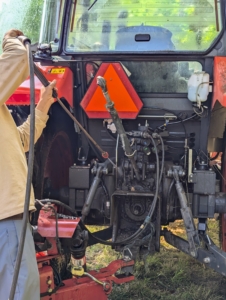 Chhiring takes time to also clean the tractor. He cleans around the mechanicals, but is careful to avoid any direct contact with bearings and seals.