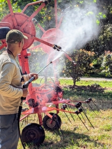 Chhiring rinses each of the tines individually to make sure they are free of any crop debris.