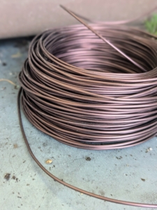 Annealed copper or anodized aluminum wire are best for bonsai. Aluminum wire is better when used for deciduous species, while the harder copper wire is best for conifers and pines. Ryan uses a sturdy gage copper wire to shape the branches.