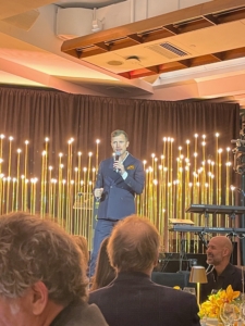 Gabriel Butu hosted the evening's live auction and paddle raise.