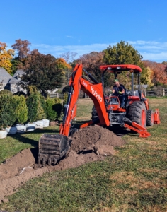 Digging a large trench like this is also good for breaking up more of the soil for new roots to grow and for better circulation of oxygen and water.