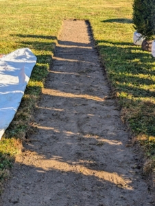 My outdoor grounds crew clears the designated beds for more maze planting. This is what the cleared area looks like once all the two-inch thick sod is pulled up. The area will also be tilled.