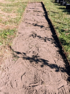 This is what the cleared area looks like once all the sod is pulled up. The exposed soil will also be tilled.