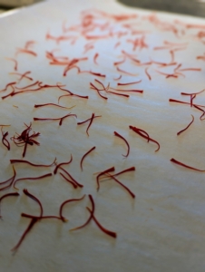 Enma places all the threads on a separate tray to dry in a warm, dark place for a few days. Saffron threads can take at least 24-hours to dry at room temperature, but the time depends on the temperature and humidity. It takes hundreds of flowers to produce a commercially useful amount, and lots of labor, which explains why saffron has long been the world’s most costly spice by weight.