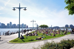 Hudson River Park includes 550 land and water acres of reconstructed piers, an Estuarine Sanctuary, display gardens, expansive lawns, athletic fields, playgrounds, dog runs, esplanades, public sculptures, and relaxing sitting areas along Manhattan’s West Side.(Photo courtesy HRPF)