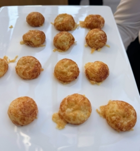 And these are called gougères. A gougere in French cuisine is a baked savory choux pastry made of choux dough and mixed with cheese. These are always a big hit at my own parties.