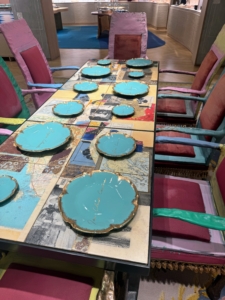 Tables were set with the iconic "Tiffany blue" colored plates.