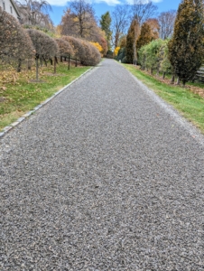 When maintaining a road it is important to ensure it has a crowned driving surface and a shoulder area that slopes directly away from the edge for water drainage.