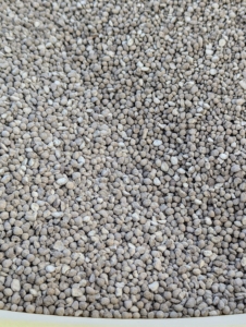 After fertilizing, Chhiring then applies agricultural lime to all the pastures and fields. Lime consists mainly of calcium carbonate and magnesium carbonate. The smaller the particle size the more effective the stone is at reacting in the soil. Lime comes in powder form and in a pelletized form such as this.