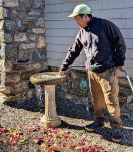 Phurba makes sure to fill up the birdbaths, so visiting wildlife can find fresh drinking water.