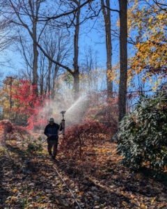 Throughout the day, Phurba moves the sprinklers, so plantings get at least a half-inch of water. He keeps track of all the water used, so nothing is wasted or left too long in one place.