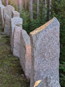 If you're not familiar with "Rockefeller's Teeth," it is a name affectionately given to the large, irregular blocks of granite that serve as guardrails. One sees many along the carriage roads at Acadia National Park.