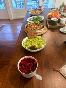 Here are more dishes on the table. Some of Christian's favorites - the Brussels sprouts salad, Gruyère and pancetta stuffing and sautéed green beans.  