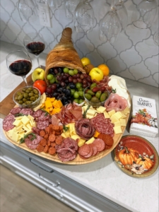 This photo is from Marquee Treasury Analyst, Heather Crocetti. It is of the Crocetti Family Cornucopia Charcuterie Board with various Italian meats and cheeses.