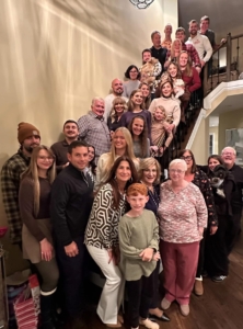 The entire family posed for a photo after their Thanksgiving feast. Whenever celebrating with the family at Jeanette and Brian's, a traditional staircase photo is always taken.