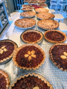 Here are more of my pies cooling in the kitchen ready to be boxed up and distributed. Chocolate pecan, brown butter maple rum pecan, pumpkin phyllo, apple crumb, and cranberry tart. No one ever forgets to pick up their sweet dessert.