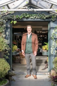 Anthony Bellomo is a landscape architect, passionate gardener, and owner of this lovely shop. Orangerie sells many home items and has two greenhouses filled with seasonal plants. (Photo by Guisela Photo)