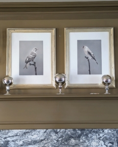 On my mantel, large silver balls sit atop candleholders. Decorations can be subtle and still so festive.